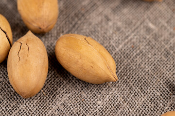 Unpeeled crunchy pecans close up