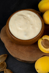 ripe yellow apricots on the table close-up