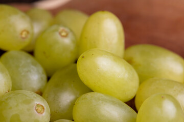 Green-yellow grapes grown in a home vineyard