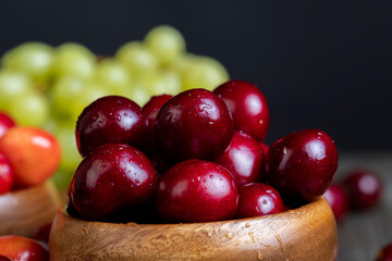 Sweet fresh cherries with other products