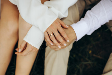 bride and groom holding hands