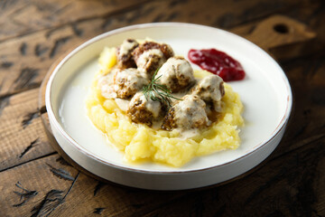 Traditional Swedish meatballs with potato and sauce