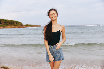 Fototapeta na wymiar woman copy sunset summer vacation beach lifestyle space ocean sea smile sand