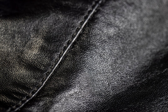 details and part of the jacket made of artificial leather in black