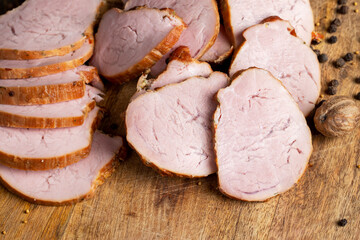Cooked pork with spices on a board