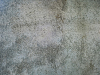 Shabby concrete wall. Grunge background. Texture of concrete wall. Shabby stone surface. Grunge pattern. Background from dirty concrete wall. Fragment of stone floor close-up. Backdrop, wallpapers