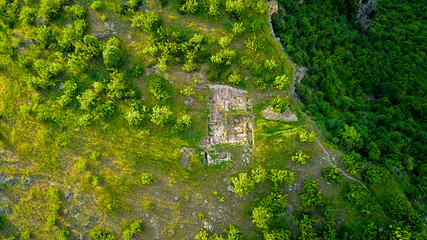 Archaeological remains of the ancient city of Heraclea Sintica from the 4th century BC. until the VI century. located near the village of Rupite (Bulgaria), on Kozhuh. Panoramic top view from a drone.