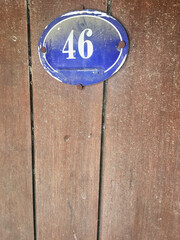 Close up of an house door number 46