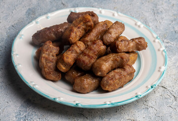 Traditional Turkish food; dry meatballs or inegöl meatballs with potatoes (Turkish name; Kuru kofte)