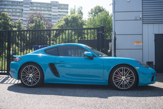 Mulhouse - France - 9 July 2023 - Front View Of Blue Porsche 718 Parked In The Street