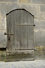 old wooden door in wall