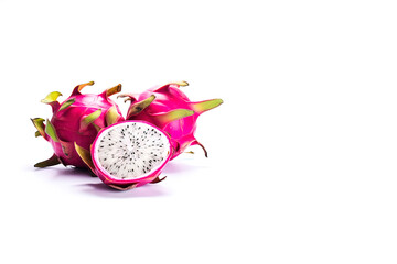 Delicious cut and whole dragon fruits (pitahaya) isolated on white background with copy space