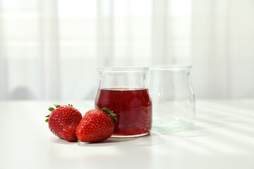 Concept of cooking tasty and sweet food - strawberry jam