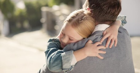 Father, girl and hug in street outdoor, bonding and happy together. Dad, embrace and cuddle with kid, child or daughter for love, care or affection, trust and welcome with family, security or comfort