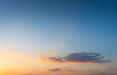 Fototapeta na wymiar Beautiful gradient sunset glow with a little bit of cloud