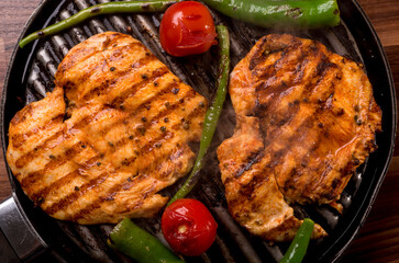 Grilled chicken breast in different variations. Food photo.