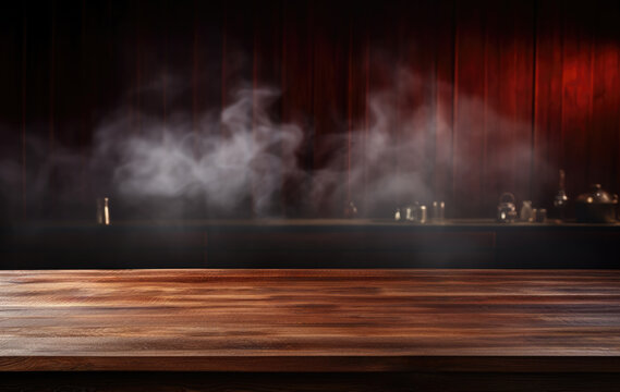 Empty wooden table in front of a red dark stage with smoke on it background. High quality photo