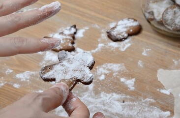 Woman's hands and delicious homemade baked goods close-up figurine. 