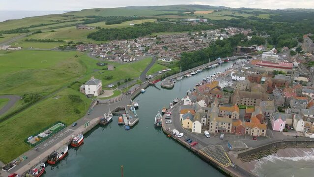 Aerial drone video of the harbour in Eyemouth Scotland