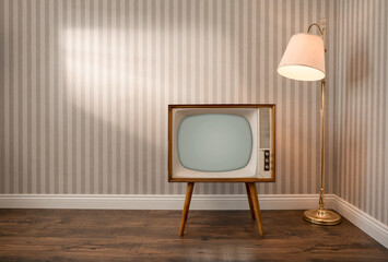 Retro TV set in empty room with copy space