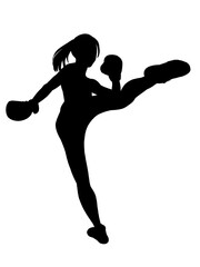 キックボクシングをする女性のシルエット