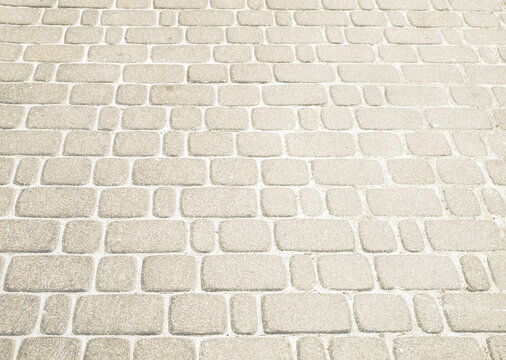 Road surface made of flat stones of various sizes