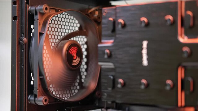 An integral part of a computer, a spinning fan. Cooling system. Computer equipment, part, assembly and repair, IT