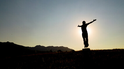 silhouette of a person with success, determination and fighting spirit