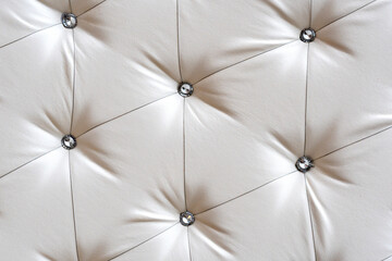Bright upholstered sofa. Leather Sofa Texture , Leathers Upholstery Pattern. Light background...