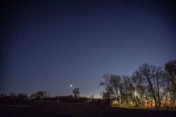 rural night landscape in summer with stars