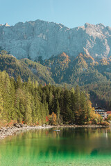 Calm relaxing landscape with Alpine mountains and autumn forest in Bavaria, Germany. Sunny day on...