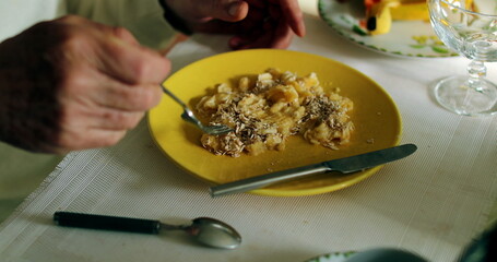Mashed banana puree on plate person eating in morning breakfast fruit with cereal