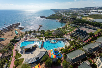 Istanbul - Turkey: 22 April 2023: Aerial view of hotels on the Mediterranean Sea coast of Side, Antalya, Turkey. The coastline is full of hotels and golf courses.