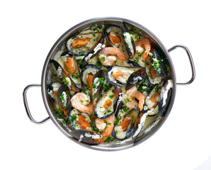 dish with mussels and prawns. mussels and prawns cooked with milk decorated with green parsley isolated on a white background.