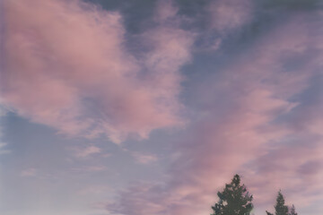 Fototapeta na wymiar Pink clouds in the blue sky. Generative AI