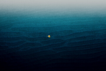 Aerial view of Milazzo beach blue sand veins, Sicily, Italy.