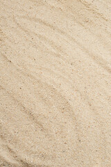 The texture of the sand about the footprints