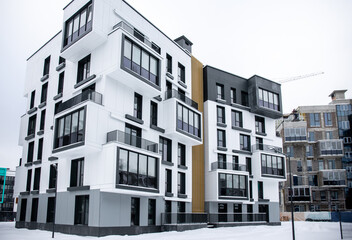 Naklejka premium Building construction of Moderne high-rise apartment buildings with balconies in the financial district 