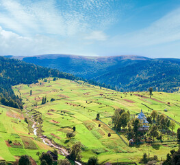 Beautiful summer mountain and small village on mountainside (Carpathian. Ukraine).