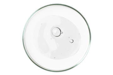 Petri dish isolated on empty background. A smear of a transparent gel, serum in a Petri dish.