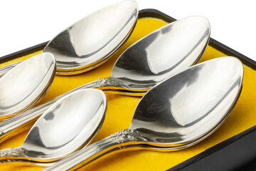 Silver spoons in a set. Close-up.