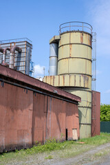 Big metal silos on an abandoned industry