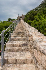 Fototapeta na wymiar Ston, Croatia 05-06-2023. View of Ston wall old fortress in Croatia.