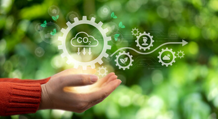 Hand touch carbon dioxide global saving clean energy earth, save the world, environment, green, eco friendly, net zero, ESG, ecology, CO2, carbon footprint.campaign save the earth, earth Day