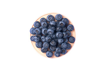 Ripe blueberries in the wooden bowl. Top view, summer berries isolated on transparent background