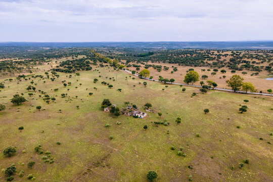 Aerial view of abandoned houses in the countryside along the Spanish and Portuguese border, Zebreira, Castel Branco, Portugal.