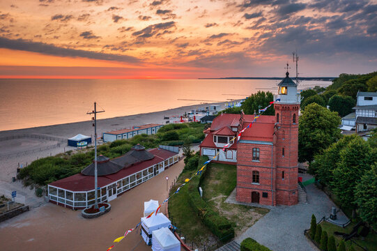 Lighthouse in Ustka by the Baltic Sea at sunrise, Poland.