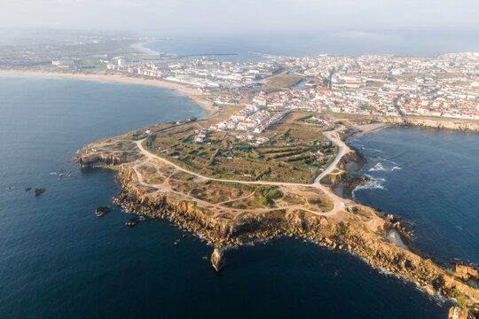Aerial view of Peniche town, a peninsula along the Atlantic Ocean coastline, Leiria, Portugal.