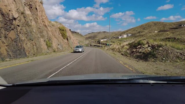Jeddah, Saudi Arabia: Hyper lapse of a point of view of a car driving on the desert road by the Al Kalada historical village near Jeddah in Saudi Arabia in the middle east. 