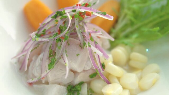 Ceviche Peruano, Traditional and fresh Peruvian Ceviche accompanied by onion, sweet potato and corn...delicious and original